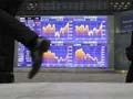 Nikkei slides, joins global selloff on BOJ jitters