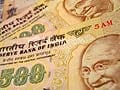 Rupee hits record low on Fed plans, nears 60 against dollar