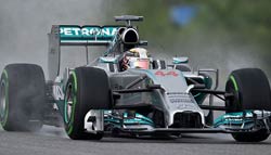 F1 Malaysian Grand Prix: Hamilton grabs 33rd pole ahead of Vettel in the wet