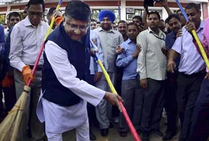 Ministers pick up broom for PM Modi's Clean India Mission