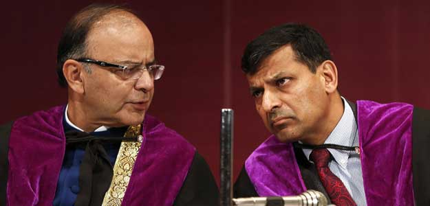 Raghuram Rajan pledged to inject liquidity in dollars and rupees as needed