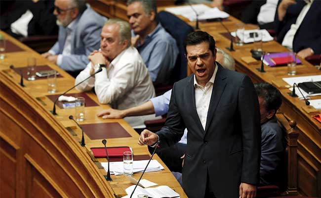 Greek Prime Minister Alexis Tsipras delivers his speech as he attends a parliamentary session in Athens, Greece.