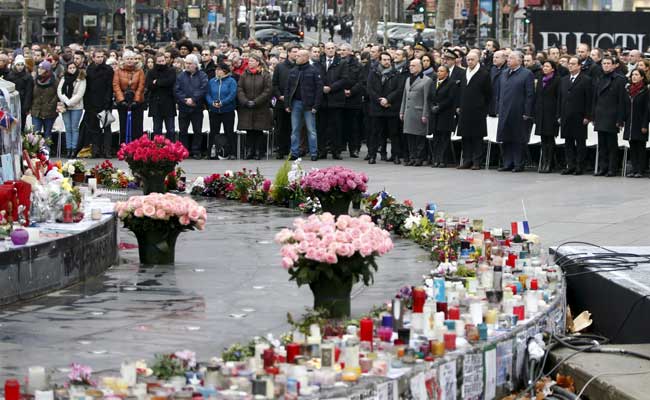 Image result for France pays homage to victims of militant attacks