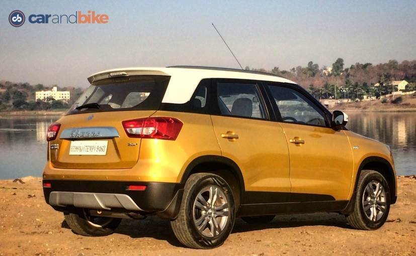 vitara brezza fiery yellow with pearl arctic white