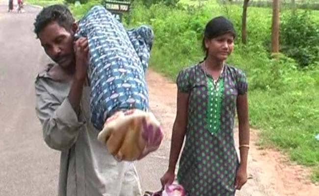 Image result for orissa man carries his dead wife on his shoulder