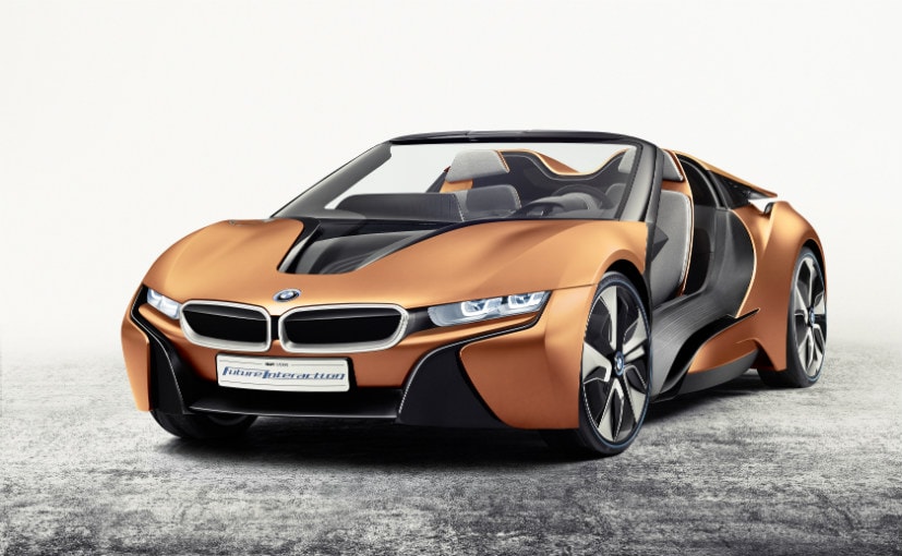 The BMW i8 drew a lot of sharp breaths, dropped many a jaw and turned quite a few heads when it first made an appearance, with its futuristic look. Now imagine an i8 without the roof, like in the pic. Yes! We got that feeling too. The German manufacturer has confirmed that it will introduce the i8 Roadster along with a mid-life facelift for the i8 at the end of 2017.