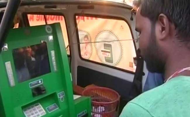 Banks Roll Out Mobile Mini ATMs In Assam Tea Gardens