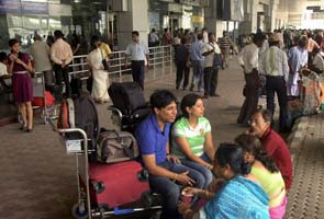 Air India deadlock: 13 international flights cancelled; angry passengers try to block road outside Mumbai airport Air India deadlock: 13 international flights cancelled; angry passengers try to block road outside Mumbai airport