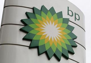 BP quarterly profits fall as oil spill still weighs