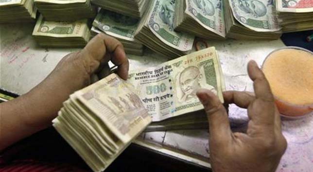 Rupee snaps four-day rally; FII debt limit sale eyed IMF managing director Christine Lagarde gives a speech at a special forum preceding in Tokyo.