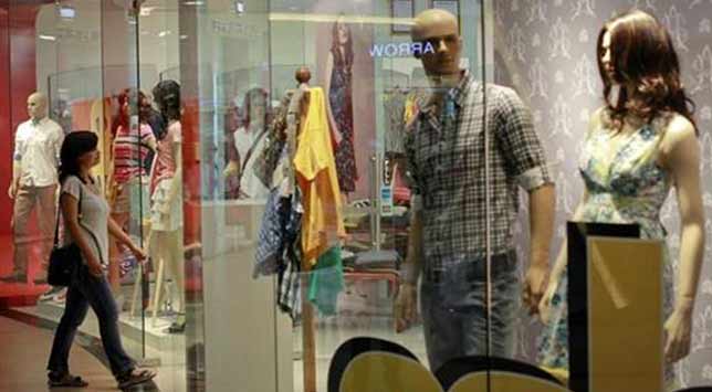 India's shopping malls lose bustle as economy cools A Dreamliner in Air India colours at an airport in Washington