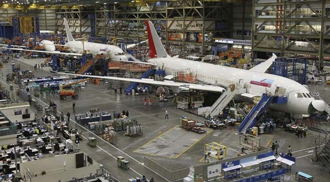 US adds more jobs, but unemployment rate rises to 8.3 per cent A Dreamliner in Air India colours at an airport in Washington