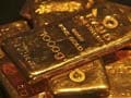 Gold gains as dollar slips, stimulus outlook eyed