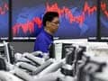 Asian shares fall as dollar touches one-month high