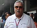 Vijay Mallya flies in for Indian GP, slams critics