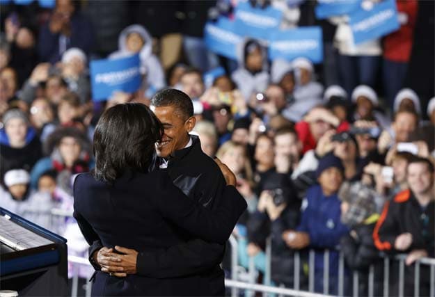 Obama wins re-election, makes history again Obama wins re-election, makes history again