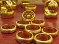 Gold drops on profit taking, posts biggest weekly gain in 2 months