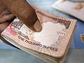 Rupee ends at 62.41, weak on dollar demand from oil firms