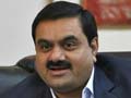 Adani stocks gain despite spotlight on Modi ties