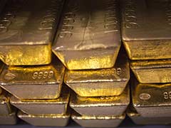 Gold Futures Fall on Weak Global Cues, Profit-booking
