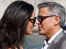 George Clooney, Amal Alamuddin Arrive in Venice for Wedding