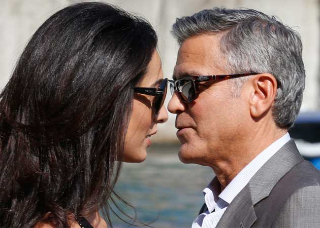 George Clooney, Amal Alamuddin Arrive in Venice for Wedding