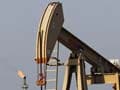 Oil Rises to $60 Per Barrel, Libya Fire Supports