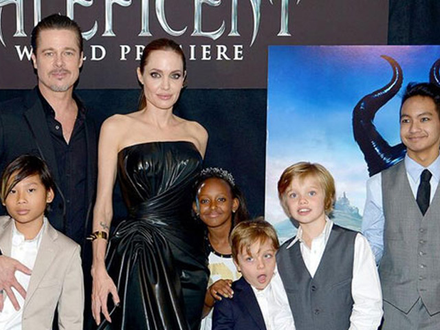 Angelina Jolie Says Brad Pitt Felt "Uneasy" When Daughters Asked to Get Inked