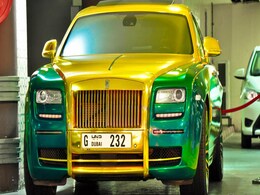 A Green and Gold Rolls-Royce Ghost A Green and Gold Rolls-Royce Ghost