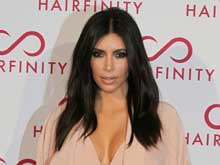 Kim Kardashian "Struggling" To Get Pregnant