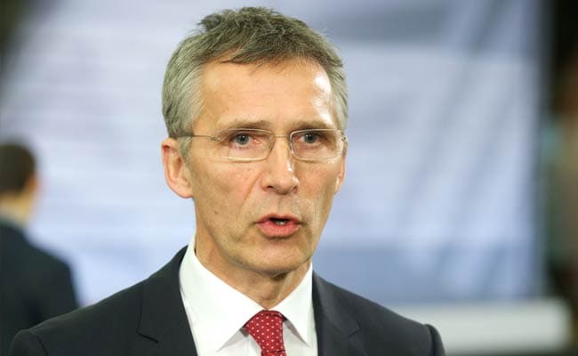 NATO Chief Jens Stoltenberg Tells Russia to Get Arms Out of Ukraine