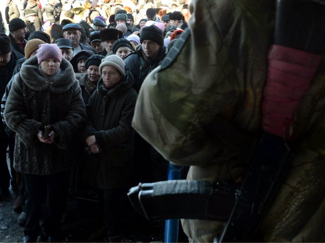 Residents of Shattered Ukrainian Town Leave Shelters in Search of Aid