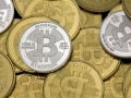 Former US Agents Charged for Bitcoin Theft During Silk Road Probe