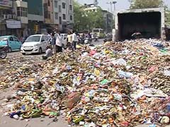 Garbage Dumped on Delhi Streets as Sanitation Workers Strike Over Non-Payment of Wages