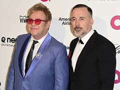 Elton John Slams Dolce & Gabbana Over 'Synthetic Baby' Comments