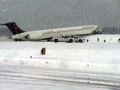 Plane Skids Off Runway in Snowstorm, Shuts New York's LaGuardia Airport