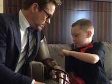 Robert Downey Jr Presents Prosthetic <I>Iron Man</I> Arm to 7-Year-Old Boy