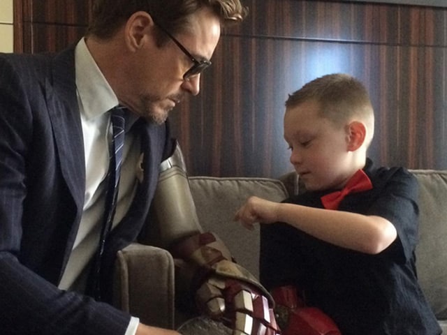 Robert Downey Jr Presents Prosthetic Iron Man Arm to 7-Year-Old Boy