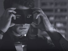 In <i>Fifty Shades of Grey</i> Sequel, Jamie Dornan Puts on a Mask