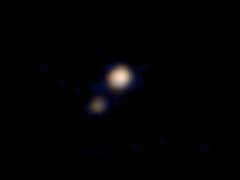 Study Shows Pluto's Moons in Chaos