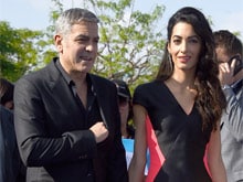 George Clooney: Amal and I Resolve Differences With Arm Wrestling
