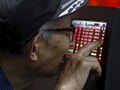 Asian Shares Dip as Commodities Drop on China Woes, Euro Sags