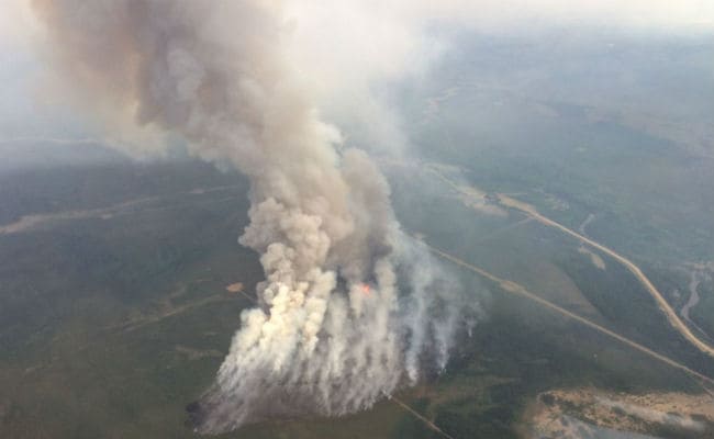 Canada Wildfires Rage on, Intensify Near Oil Sands Sites