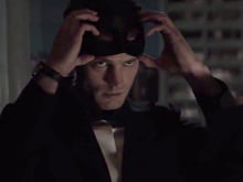 <i>Fifty Shades Darker</i> Teaser: Jamie Dornan Gets Ready for Masquerade Party