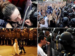 In Powerful Photo of Macedonian Protests, Woman Uses Police Shield to Apply Lipstick In Powerful Photo of Macedonian Protests, Woman Uses Police Shield to Apply Lipstick