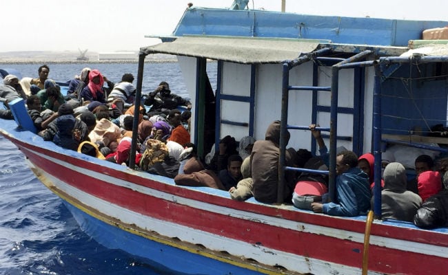 Myanmar Escorting Boat Crammed With Migrants to 'Safe' Area