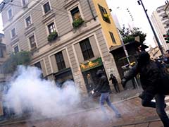 Police Use Tear Gas on Stone-Throwing Protesters at Milan Expo