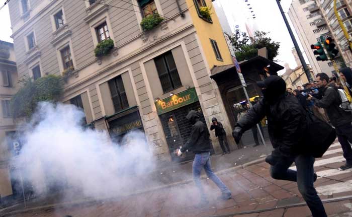 Police Use Tear Gas on Stone-Throwing Protesters at Milan Expo