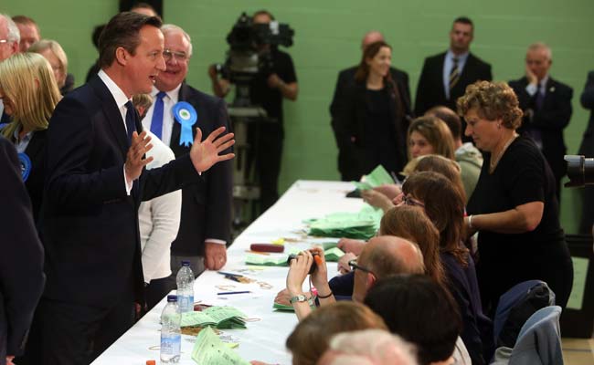 David Cameron Fans in London Cheer Signs of Election Win