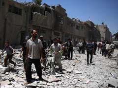 Syria Regime Raids Kill 10 in Damascus Suburb: Report